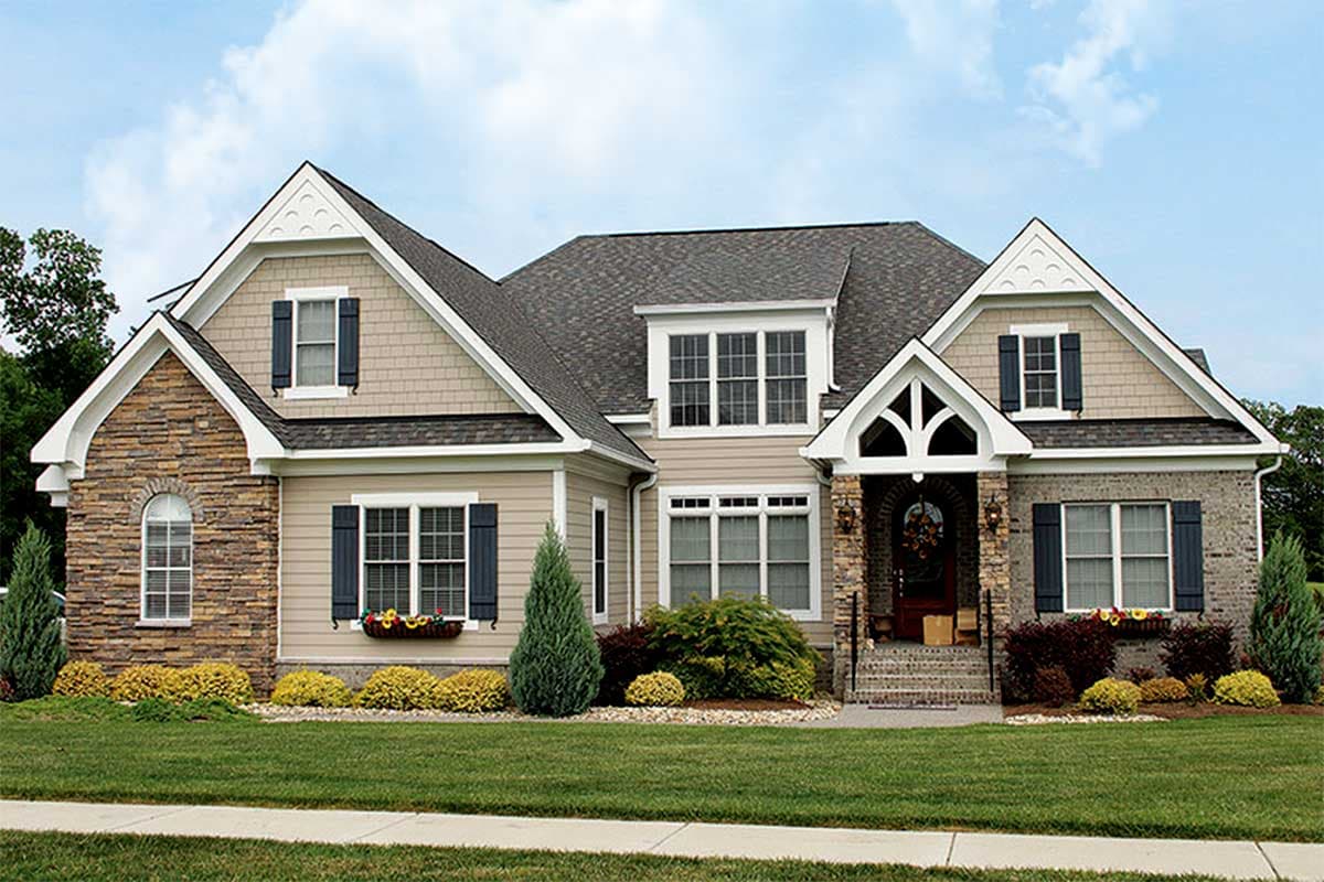 House plan exterior with two stories. Features include multiple gables, stone facade accents, and a covered front entry porch.