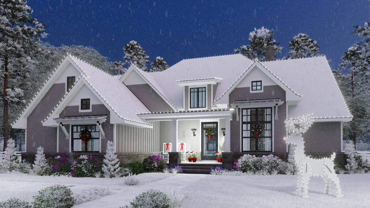 Modern Farmhouse house plan exterior with multiple gables, a covered porch, and decorative light strings.
