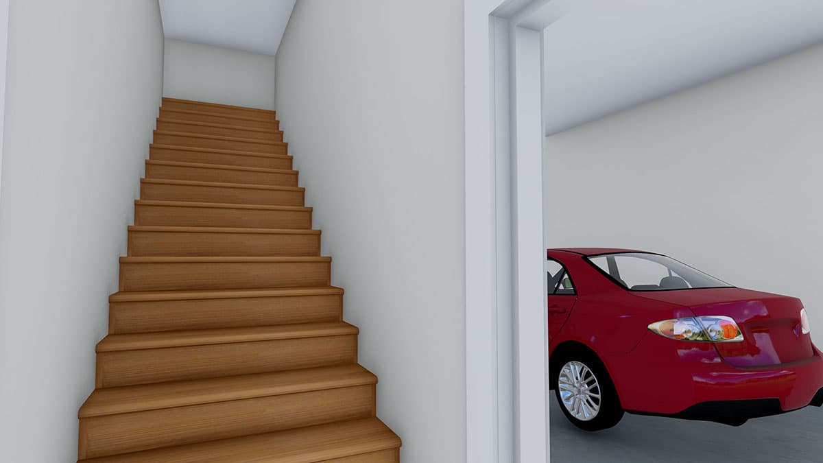 Interior view of a wooden staircase leading to a garage with a red car.