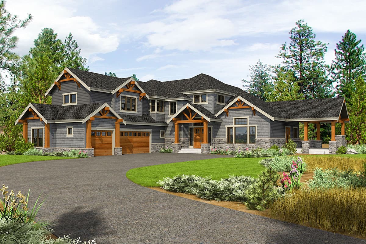 Craftsman house plan exterior with multiple gables, exposed rafter tails, and a front-entry porch. Features a two-car garage and stone accents.