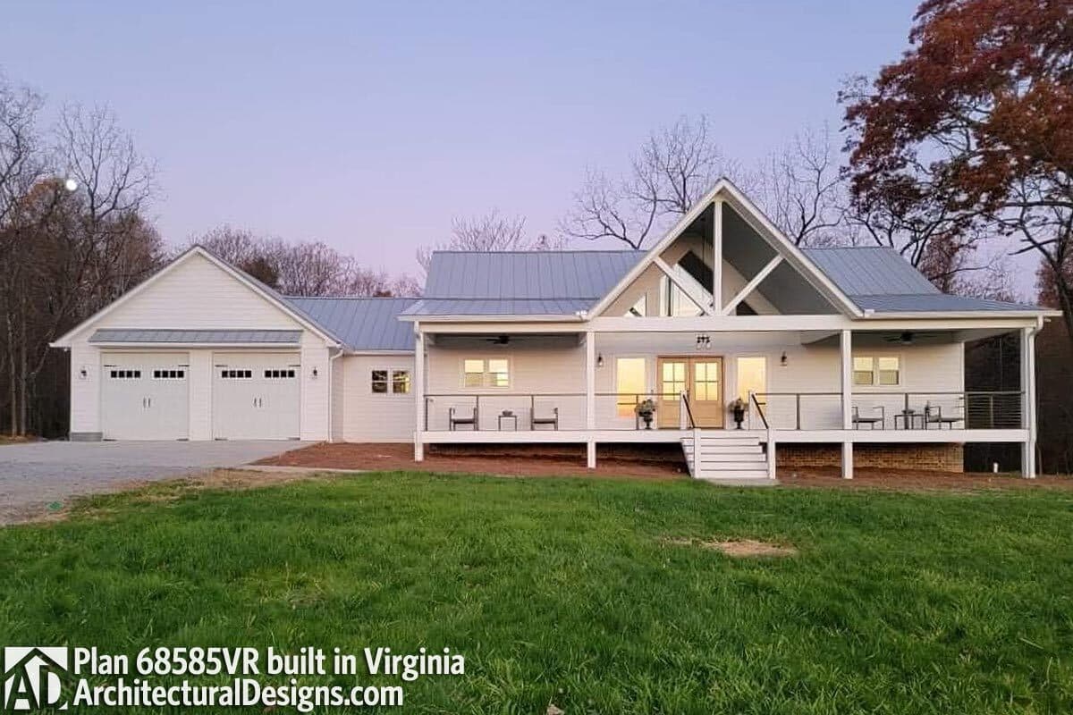 House plan exterior: Modern farmhouse style, single-story with attached three-car garage, large covered porch, and prominent gable.