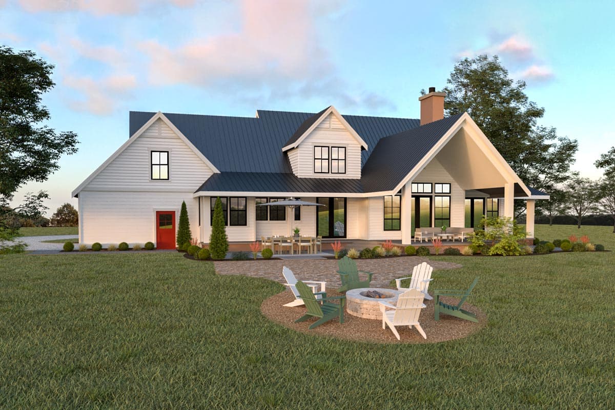 Modern farmhouse house plan exterior with white siding, dark metal roof, dormers, gables, covered porch, and patio.