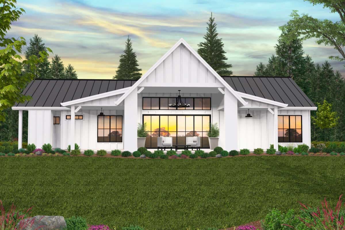 Modern Farmhouse house plan exterior with prominent gables, a metal roof, and large floor-to-ceiling windows.