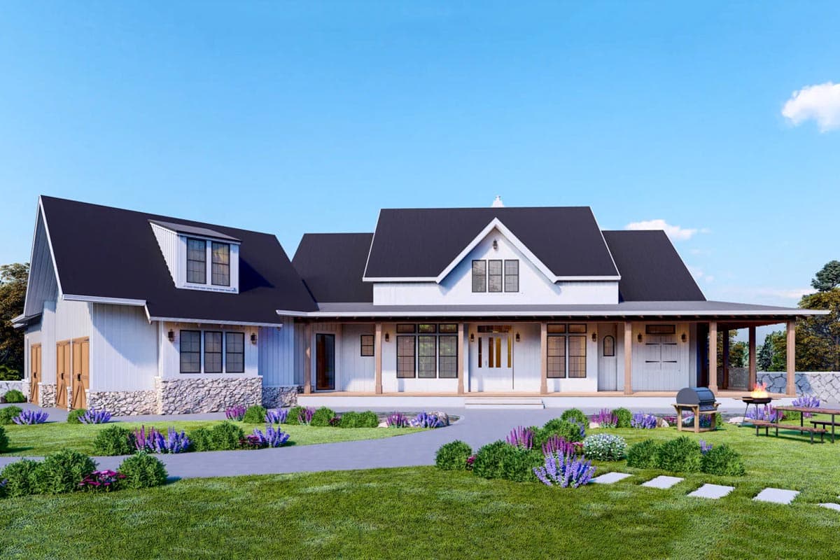 Modern Farmhouse house plan exterior with wide front porch, stone base, gables, dormer, and a two-car garage.