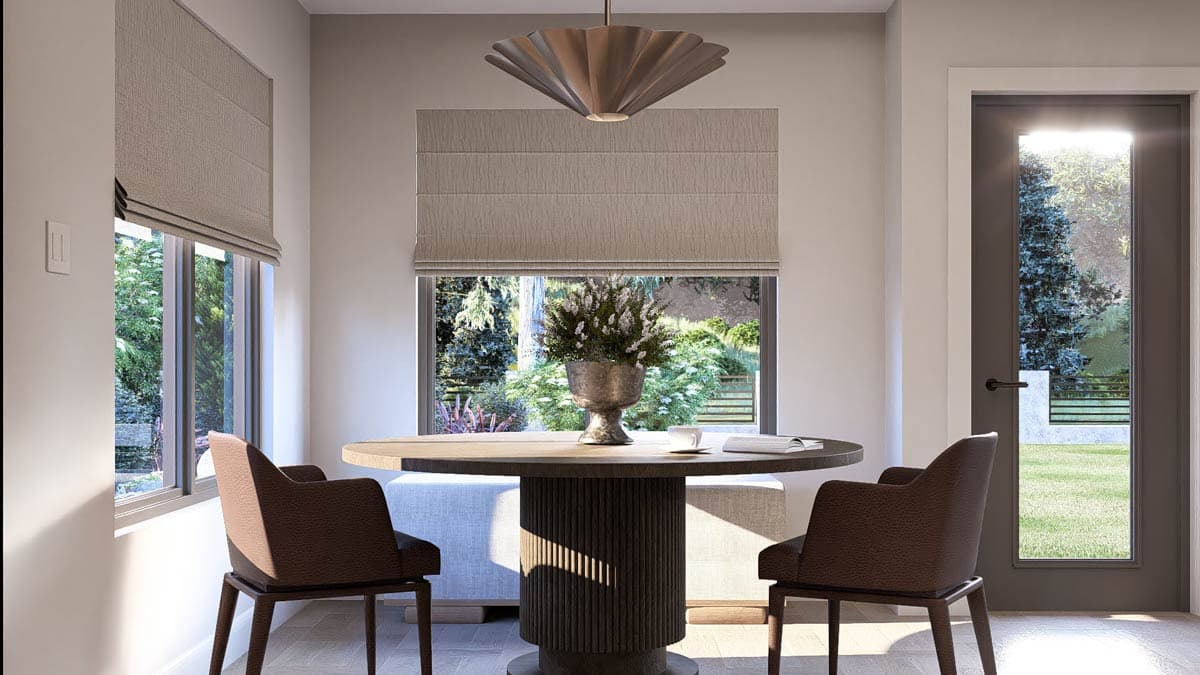 Interior rendering of a dining nook with a round pedestal table, two chairs, a pendant light, and large windows overlooking a garden.