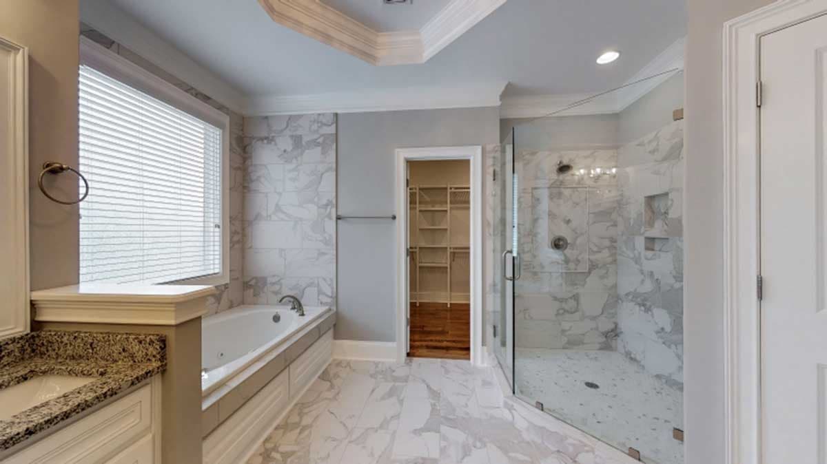 Plan 710116BTZ: 2-Story Home Plan with Angled Kitchen Island - Image #9 - European, French Country, Southern, Traditional