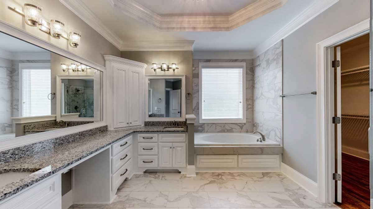 Plan 710116BTZ: 2-Story Home Plan with Angled Kitchen Island - Image #10 - European, French Country, Southern, Traditional