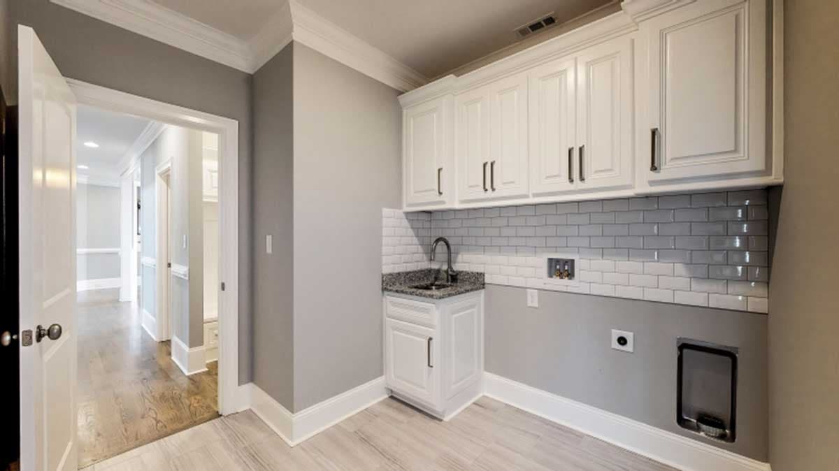 Plan 710116BTZ: 2-Story Home Plan with Angled Kitchen Island - Image #11 - European, French Country, Southern, Traditional