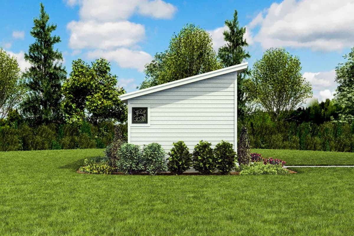 Modern shed exterior with horizontal siding, a single window, and a sloped roof.