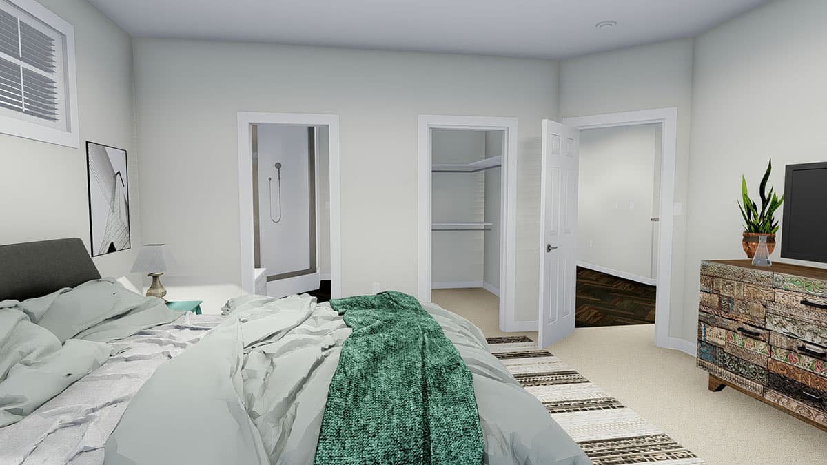 Bedroom with adjacent shower room and walk-in closet. Features a window, bed, dresser, and TV.