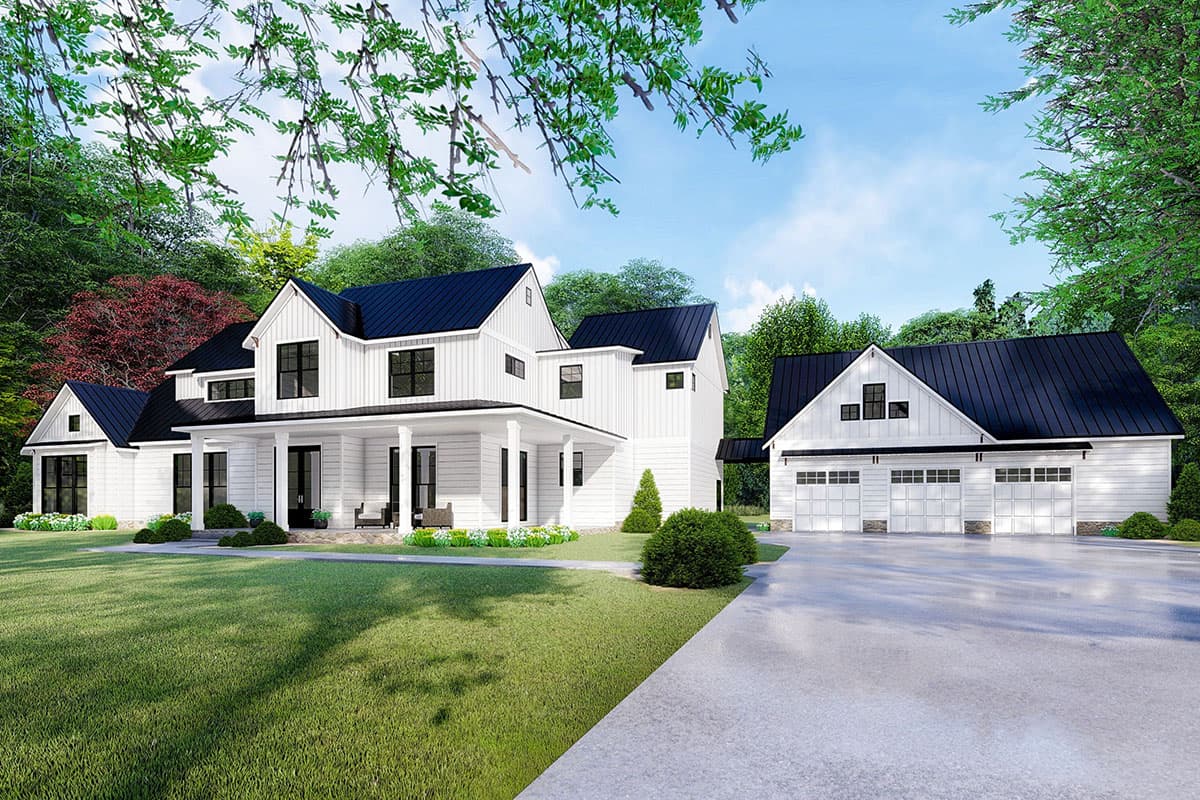 Modern Farmhouse exterior with two stories, a front porch, multiple gables, and a detached garage with three bays and a black metal roof.