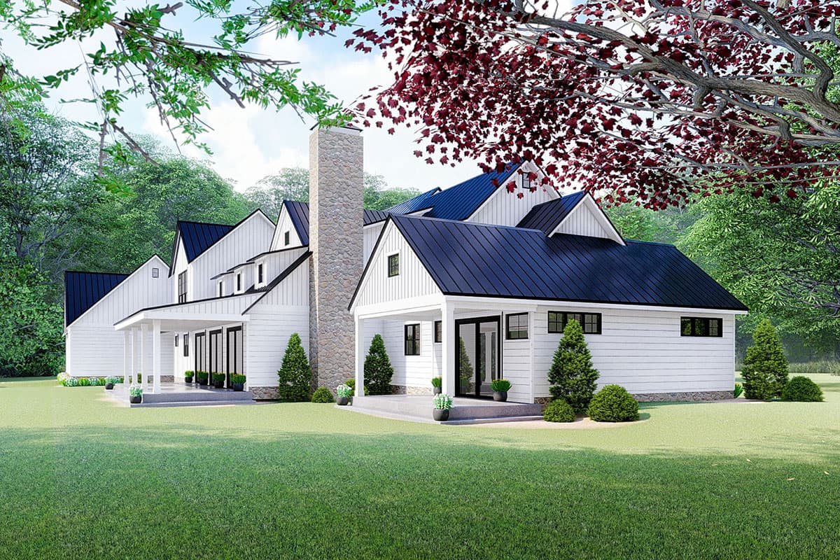 Modern Farmhouse house plan exterior with white siding, dark gables, stone chimney, and covered porch.