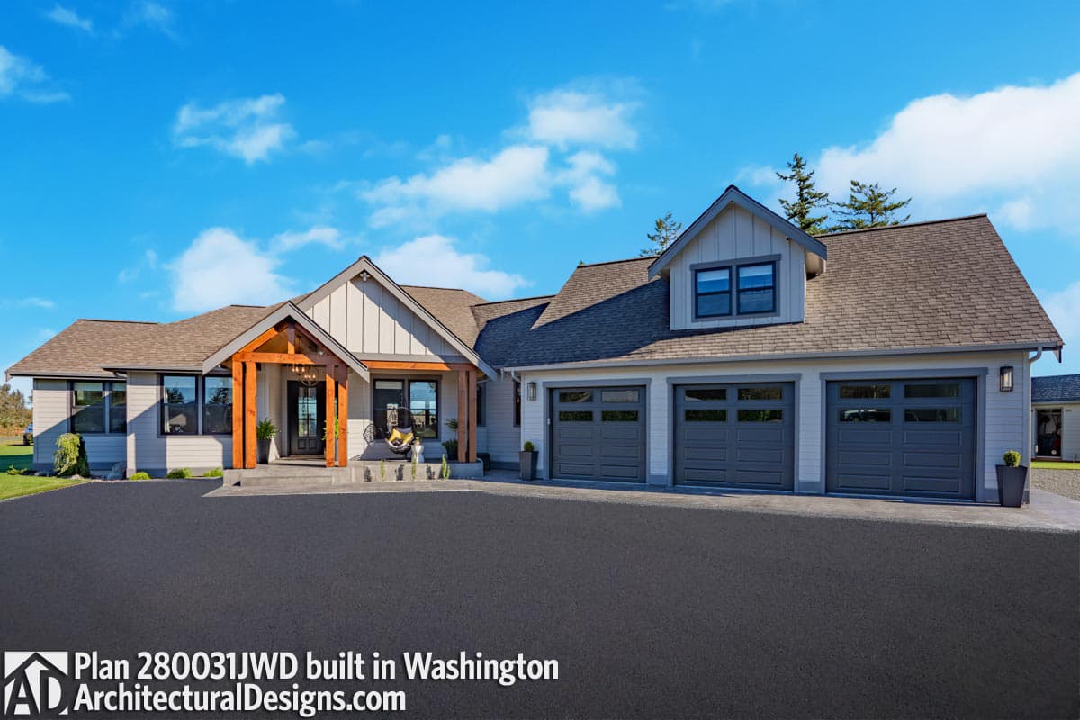 Modern Farmhouse house plan exterior with exposed wood beams, a covered entry, dormer, and a three-car garage.