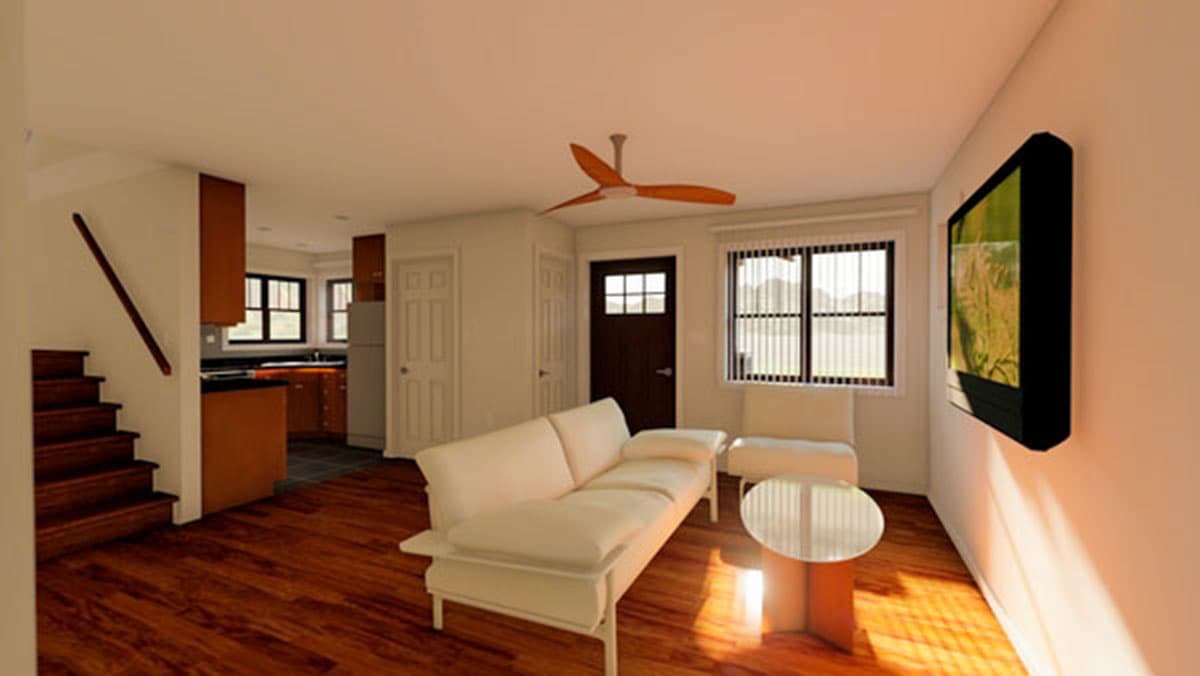 Interior rendering showing a living area with a sofa, coffee table, and TV, adjacent to a kitchen and staircase.