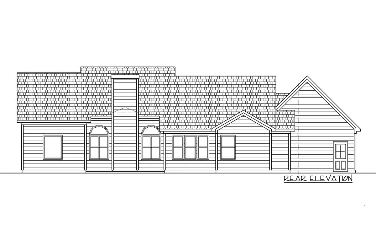 Rear elevation of a house plan showing varied rooflines, a central chimney, and multiple window styles including arched.