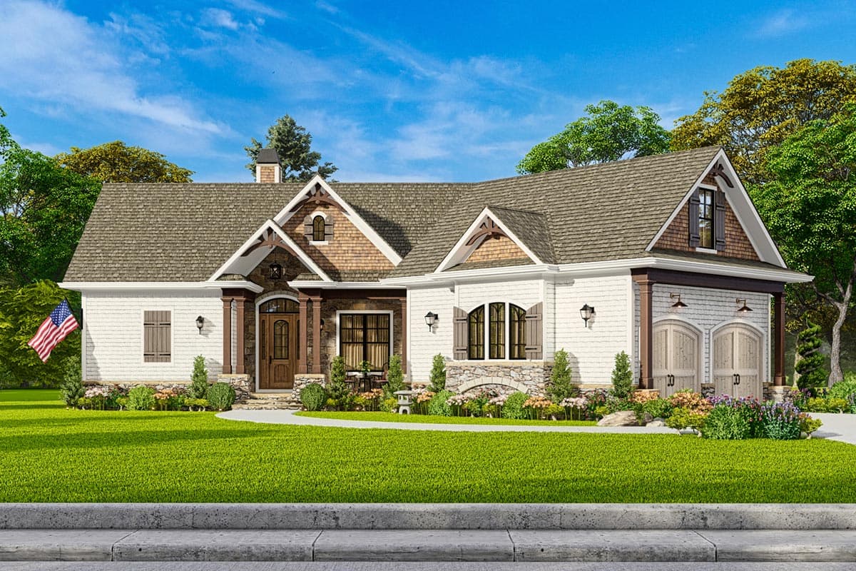 House plan exterior: One-story Craftsman home with gabled roof, arched windows, stone accents, and two-car garage.