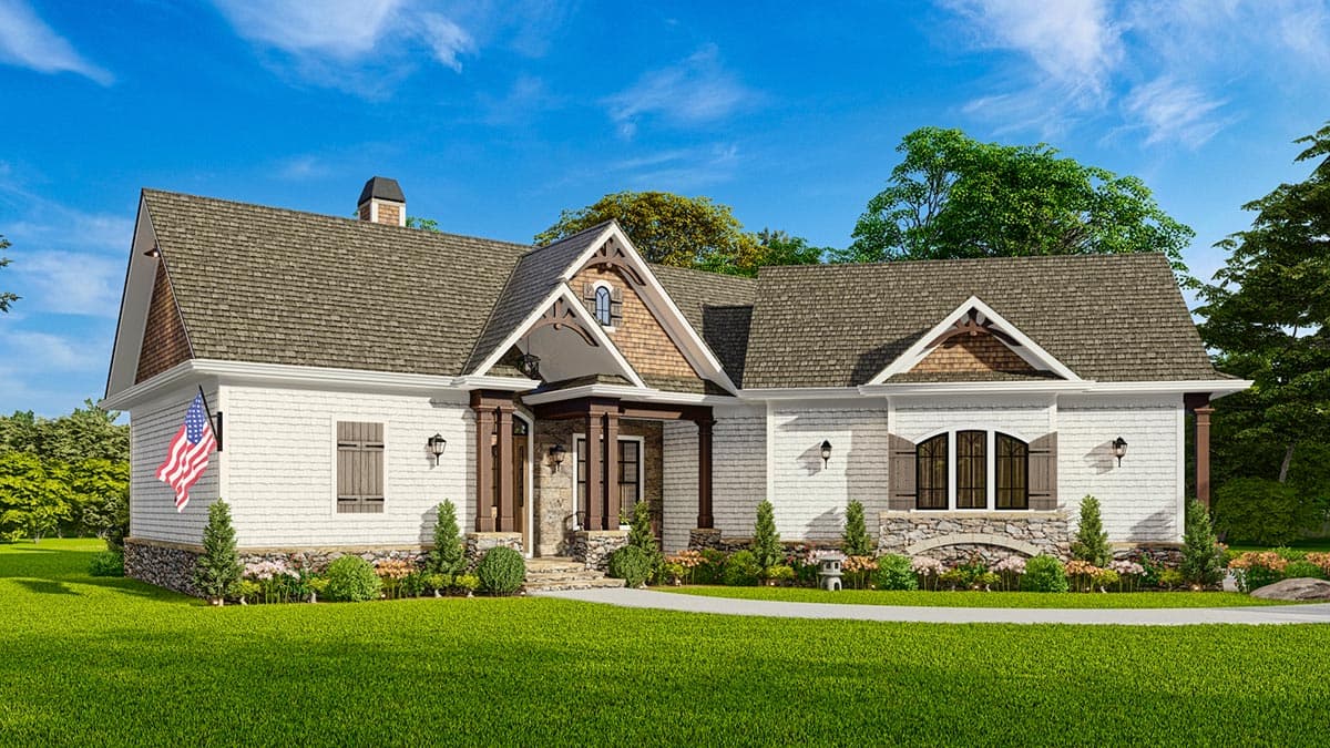 House plan exterior: Traditional style, one-story with prominent gables, stone foundation, covered entry porch, and decorative window shutters.