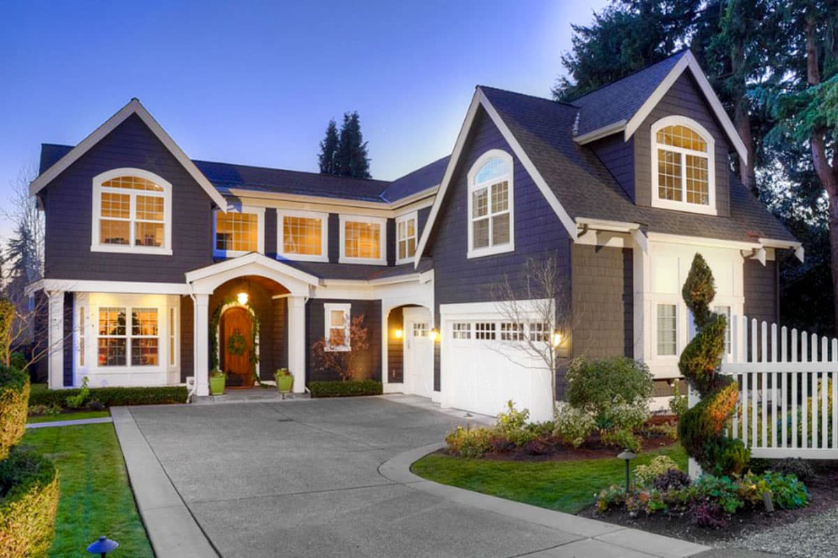 House plan exterior with Craftsman style. Features include multiple gables, a front-entry porch, and a side-entry garage. Two-story structure.