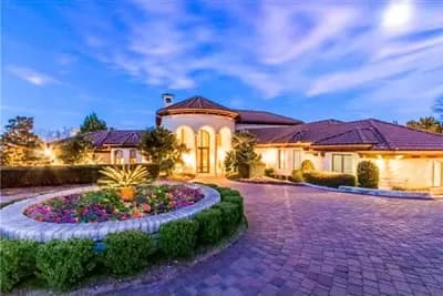 Luxurious Mediterranean House Plan with Grand Two-Story Foyer and Family Room