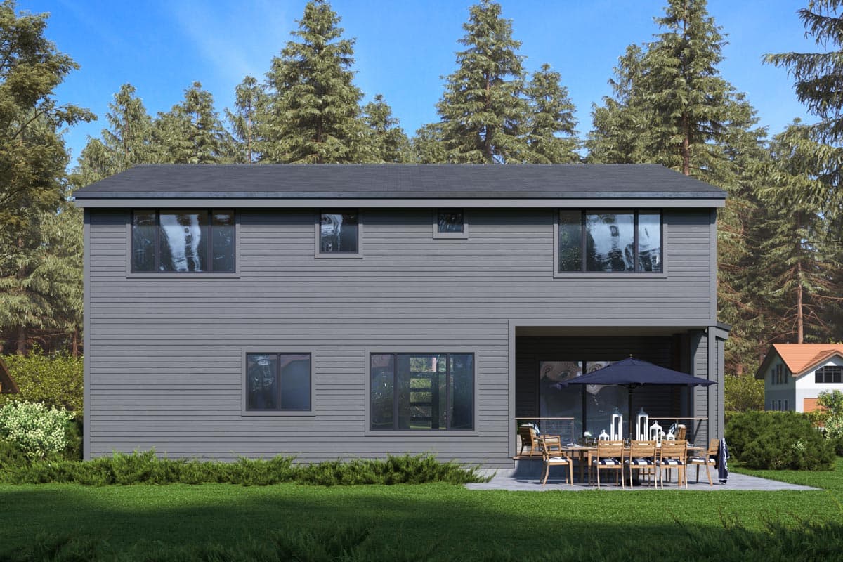 Modern two-story house plan exterior with horizontal siding, a flat roof, and an covered patio with outdoor dining set.