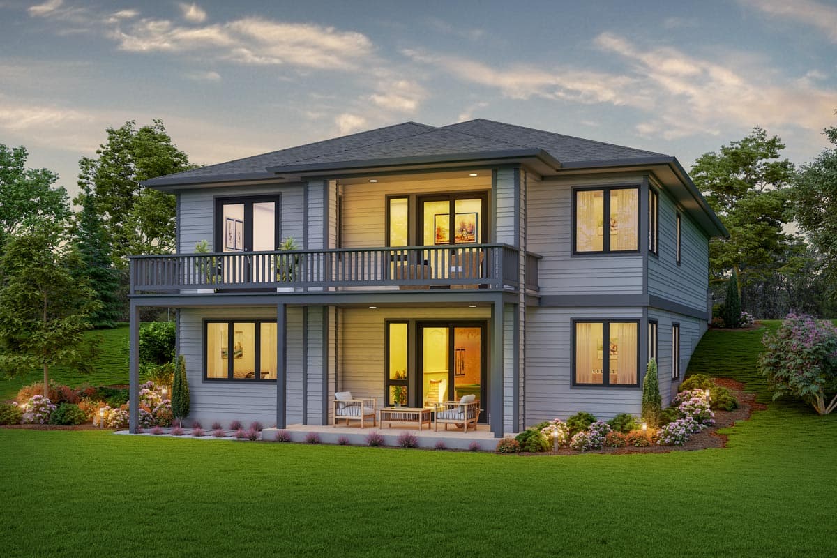 Modern house plan exterior featuring two stories, a covered deck on the upper level, and a patio on the lower level with seating.
