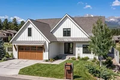 Modern Farmhouse Plan Offering Convenient Living