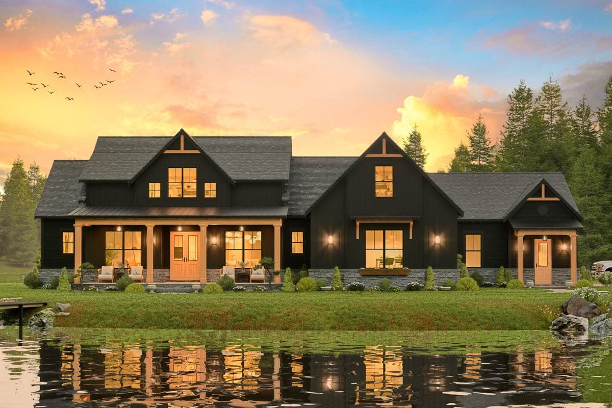 Modern Farmhouse house plan exterior with a large covered porch, gables, and dark siding.