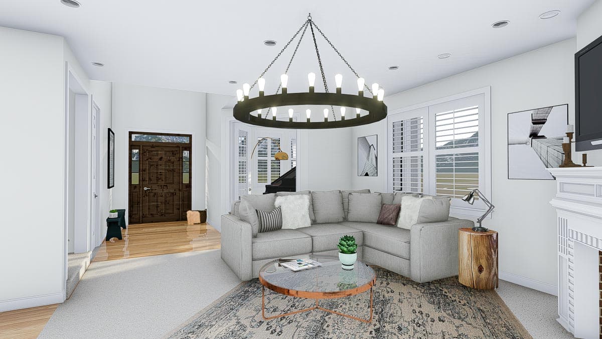 Rendering of a living room with a sectional sofa, fireplace, bay windows, and a large circular chandelier.