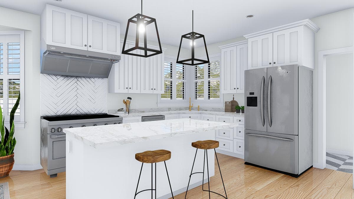 Kitchen interior with white cabinets, a central island with seating, stainless steel appliances, and pendant lighting.