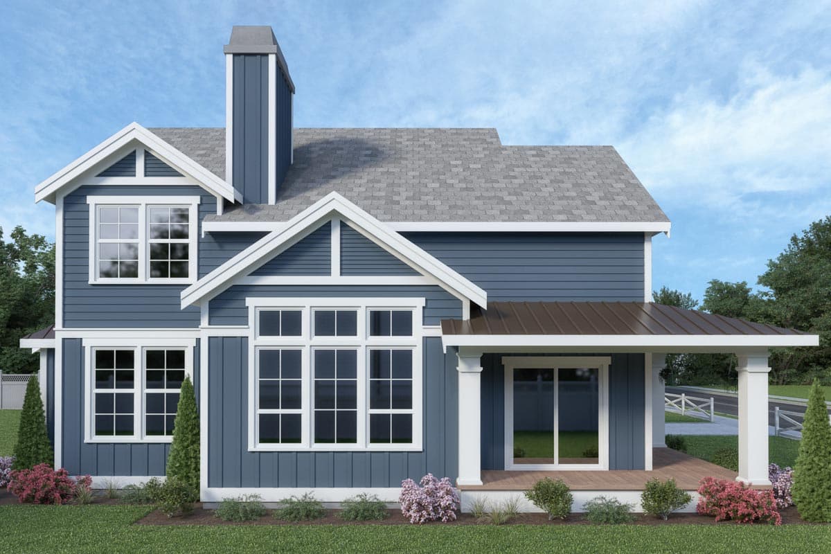 House plan exterior: blue siding, white trim, gables, large windows, and a covered porch with columns.