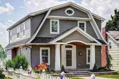 Two-Story Country Cottage House Plan with Gambrel Roof