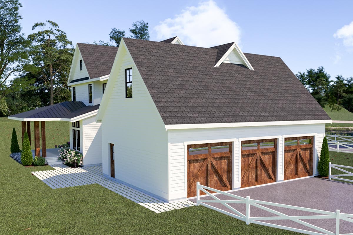 Modern Farmhouse house plan exterior with two stories, covered porch, dormers, and a three-car garage.