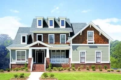 Triple Dormered Craftsman Home Plan with Tapered Columns