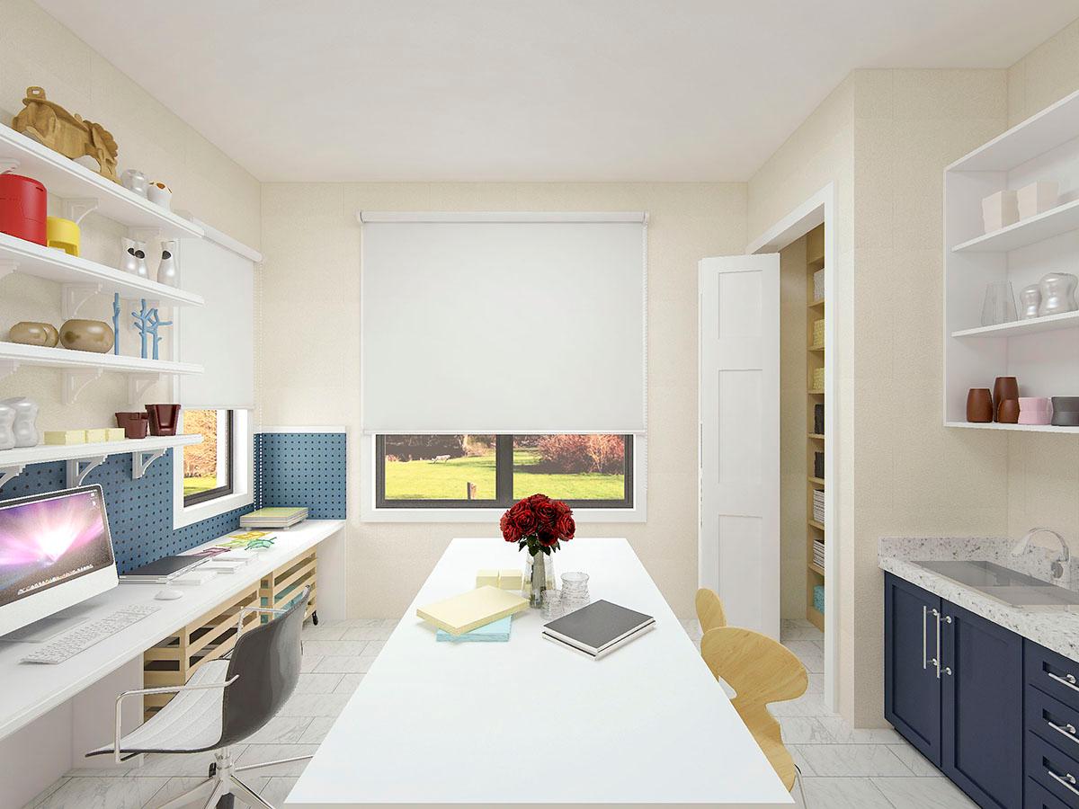 Craft room with dual workstations, large work table, sink, and ample shelving. Open pantry visible.