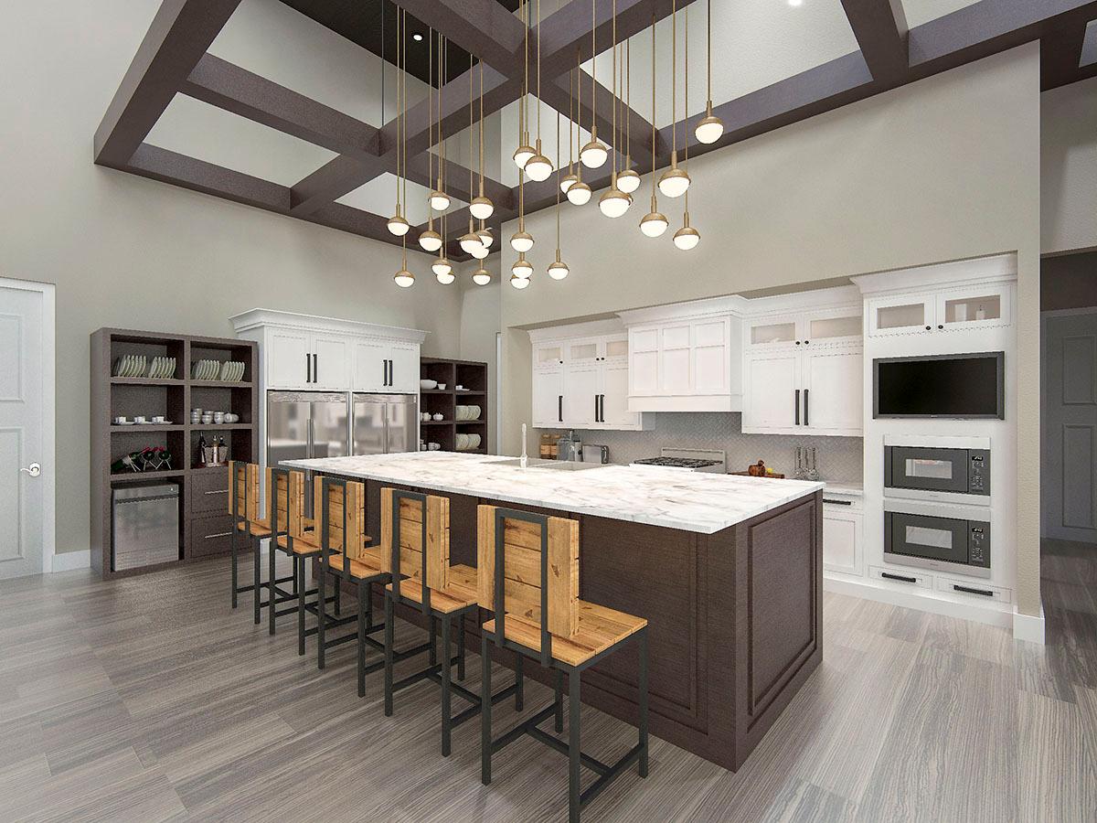 Modern kitchen with large island, white cabinetry, stainless steel appliances, and a coffered ceiling with pendant lights.