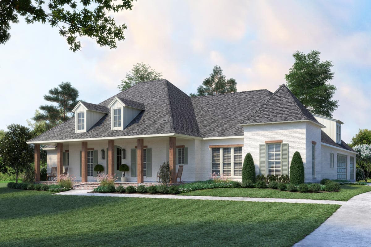 House plan exterior: white brick ranch with a long covered front porch, wood columns, dormers, and a side-facing garage.