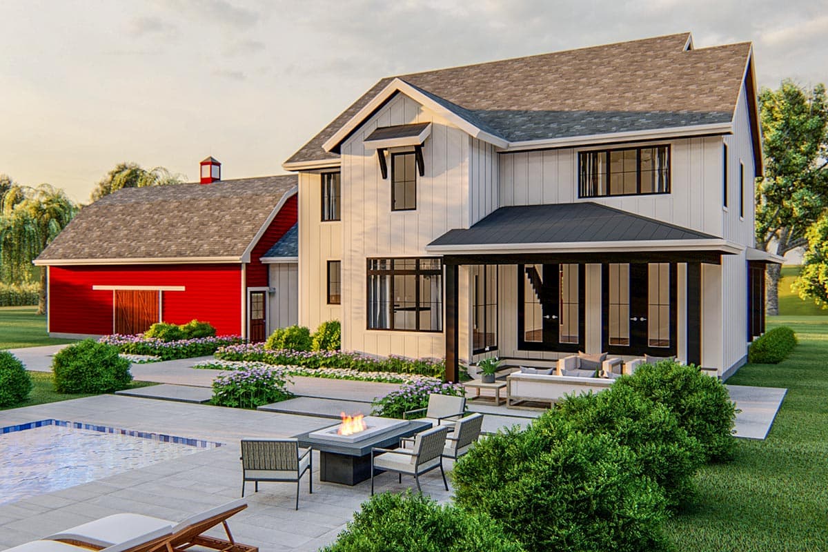 Modern Farmhouse style house plan exterior with two stories, white board and batten siding, gables, and a covered porch.