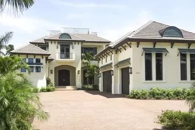 Exclusive Contemporary Vacation Home Plan with a Golf Cart Area in Garage