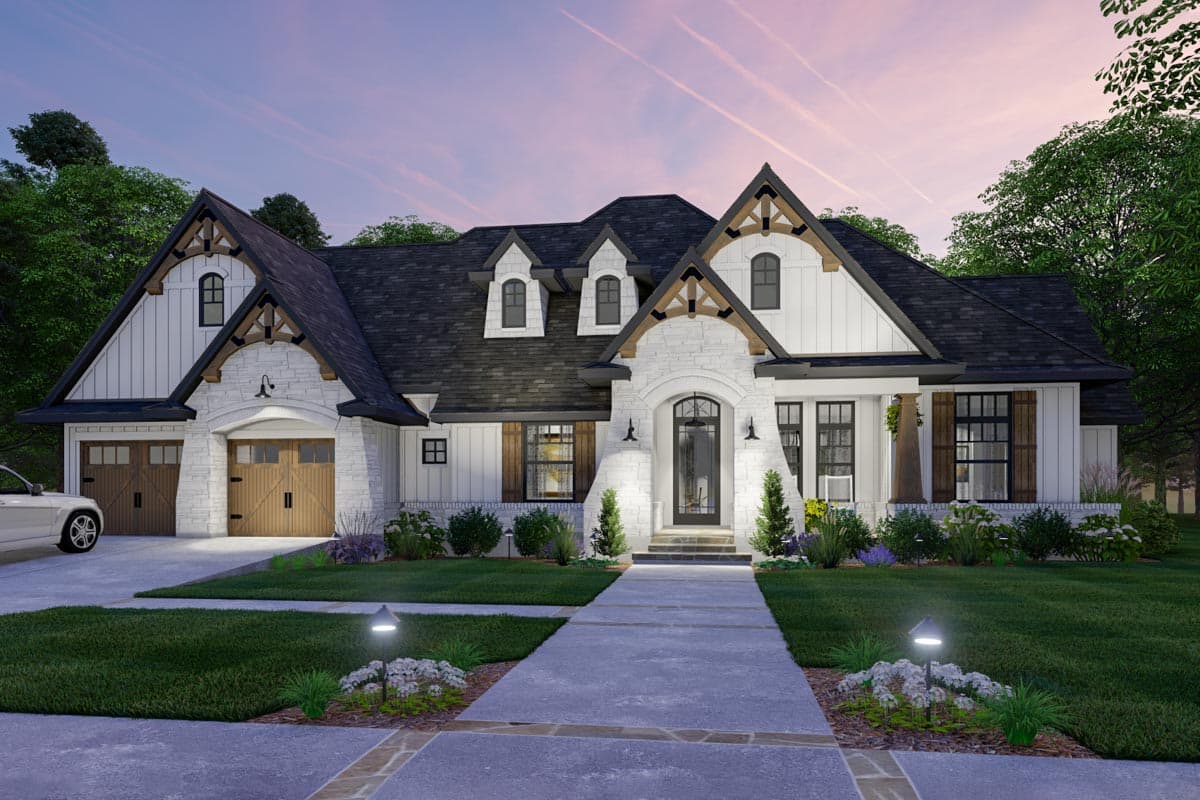Modern Farmhouse house plan exterior with stone accents, gables, dormers, and a side-entry garage.