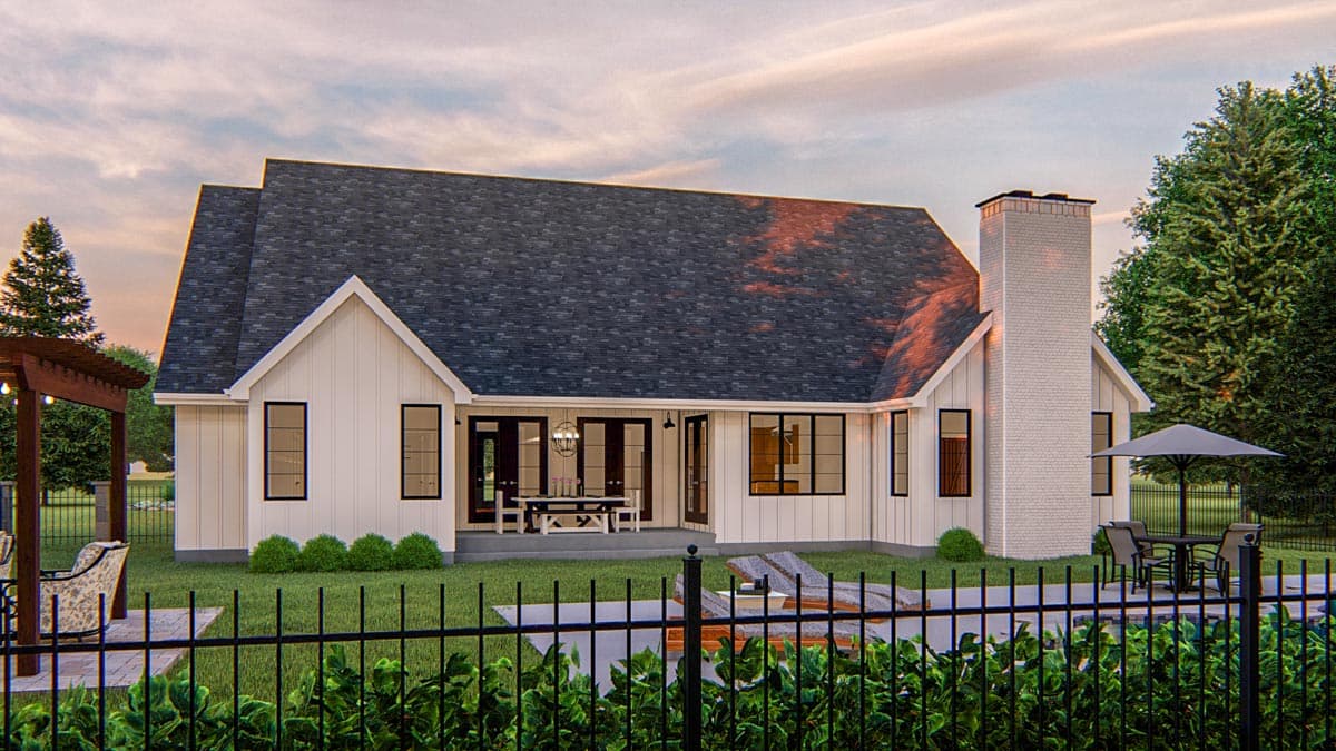 Modern Farmhouse style house plan exterior with board and batten siding, gables, dark windows, and a prominent brick chimney.