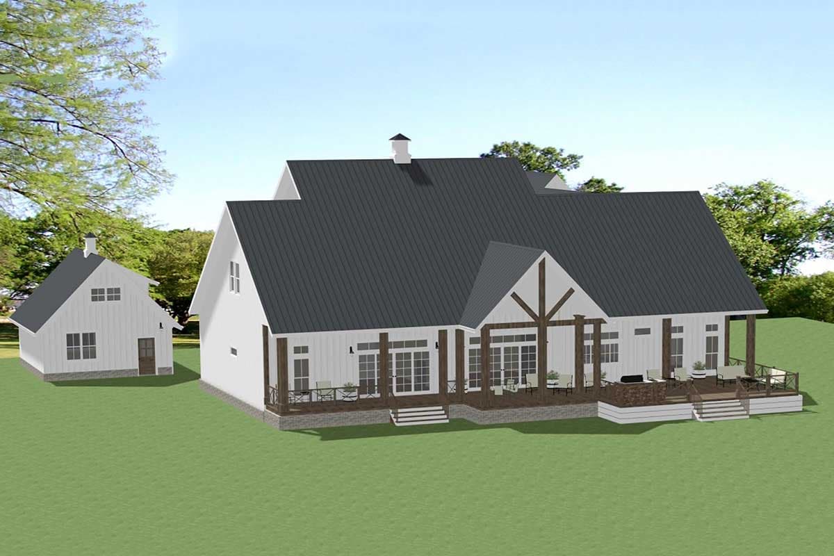 Modern farmhouse house plan exterior with white board and batten siding, dark metal roof, large deck, and attached garage.