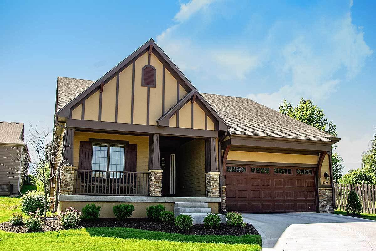 Modern Farmhouse house plan exterior with gables, covered porch, and attached garage.