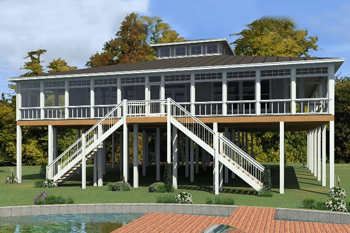 House plan exterior. Two-story elevated house with screened porch. Features include gable roof, white railings, and staircases.