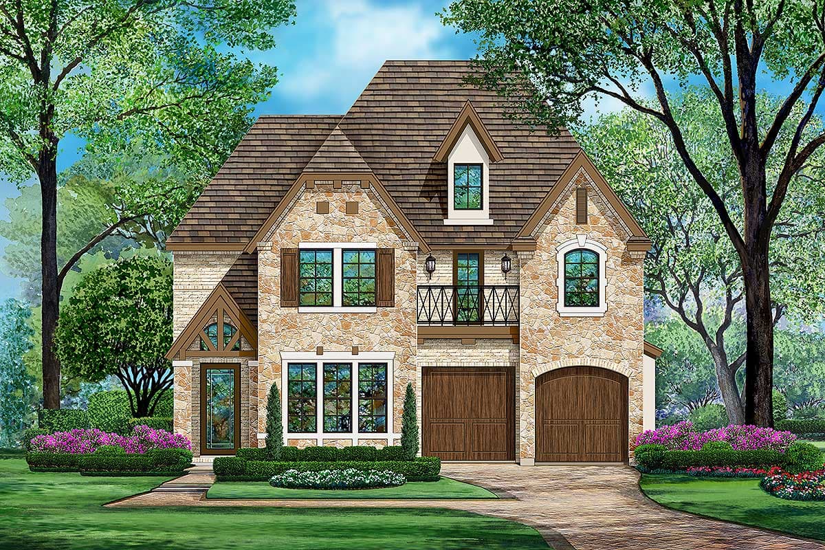 House plan exterior with stone veneer, gabled roof, and arched garage door. Features dormers, a wrought iron balcony, and multi-pane windows.