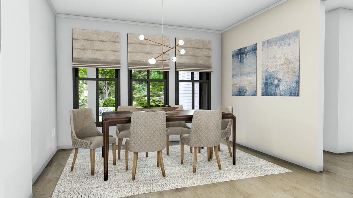 Dining room with a dark wood table, upholstered chairs, and abstract art. Natural light streams in through large windows.