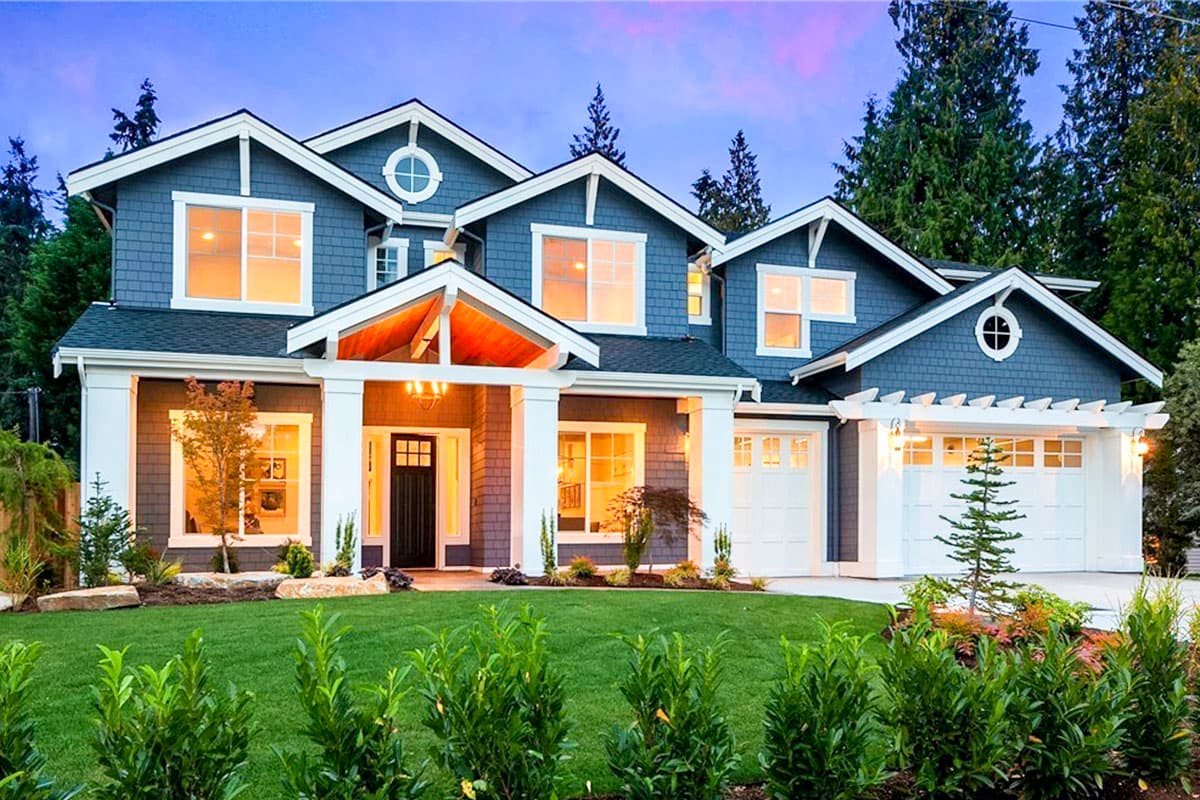 House plan exterior with Craftsman style, two stories, front porch with columns, multiple gables, and attached garage with pergola.