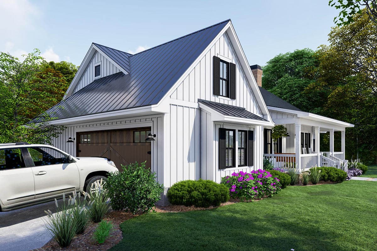 Modern Farmhouse house plan exterior with white board and batten siding, metal roof, detached garage, and wraparound porch.