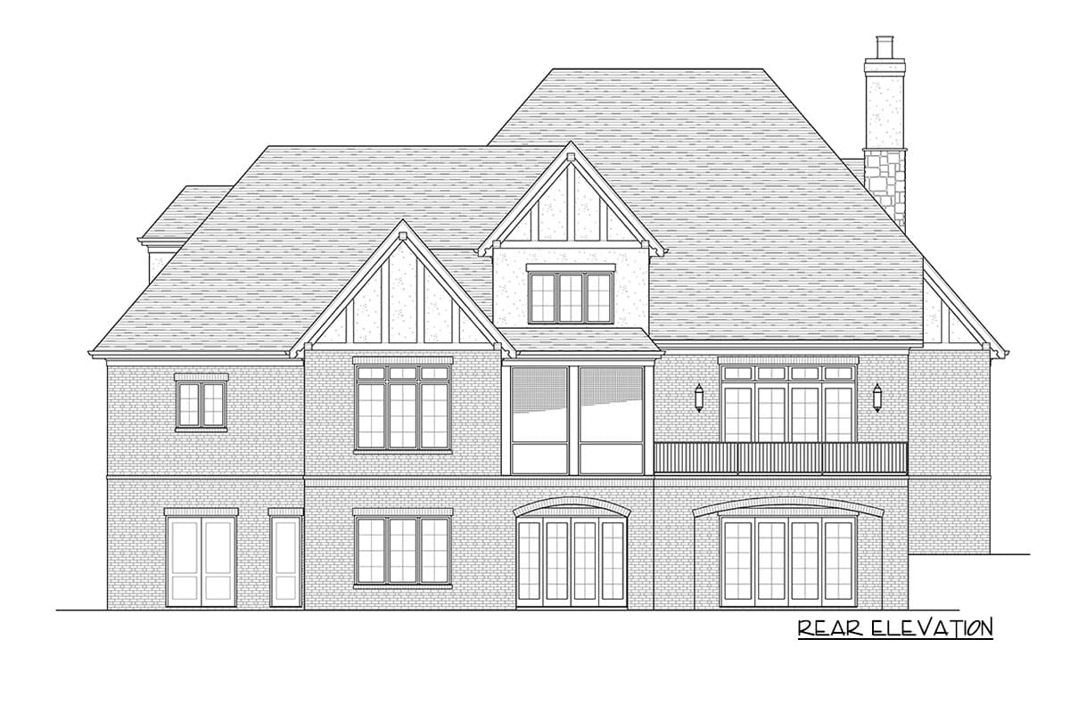 Rear elevation house plan with gables, dormers, multiple windows, French doors, and a balcony.