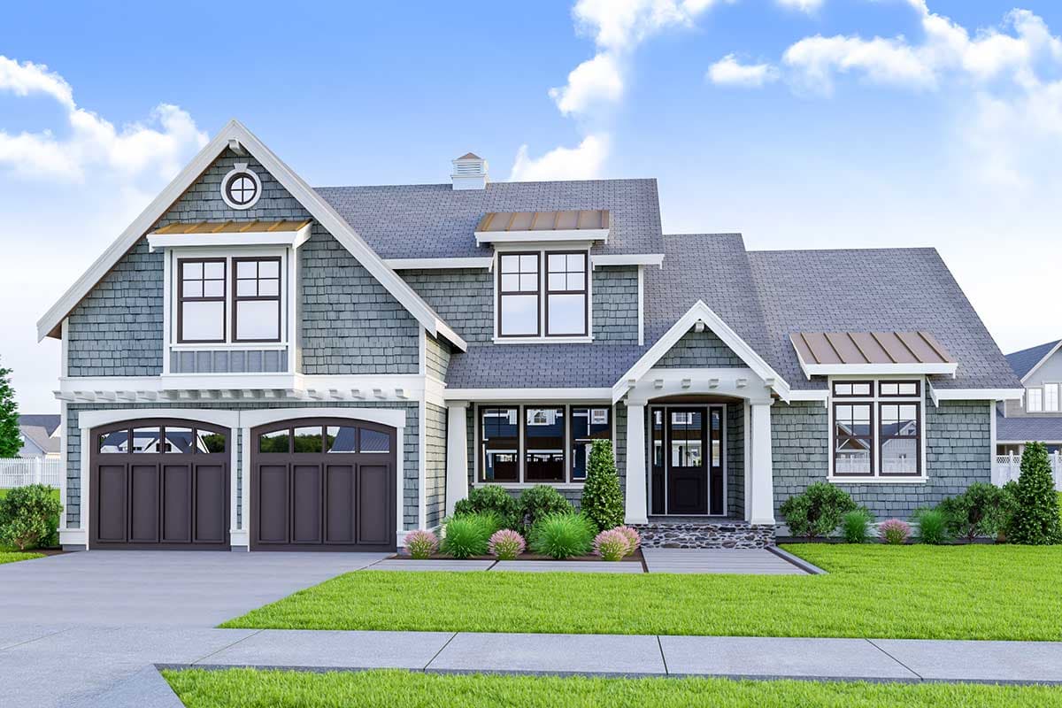 House plan exterior featuring a gable roof, two-car garage, covered entry porch, and dormer windows.