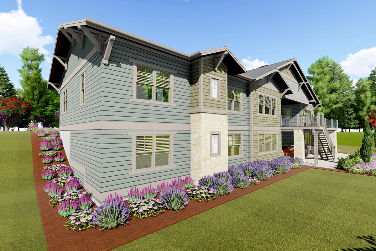 House plan exterior: Two-story modern farmhouse with gabled rooflines, decorative brackets, stone accents, and a rear deck with stairs.